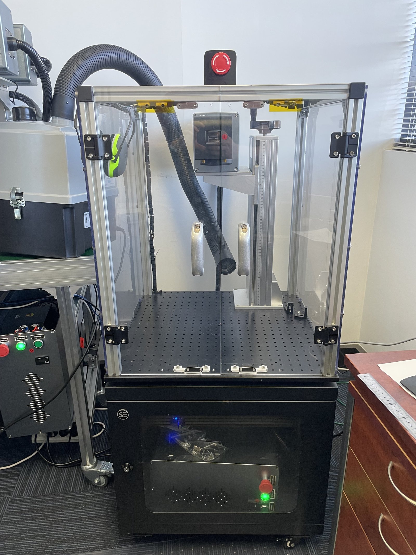 Visionics laser marking rig in its safety enclosure